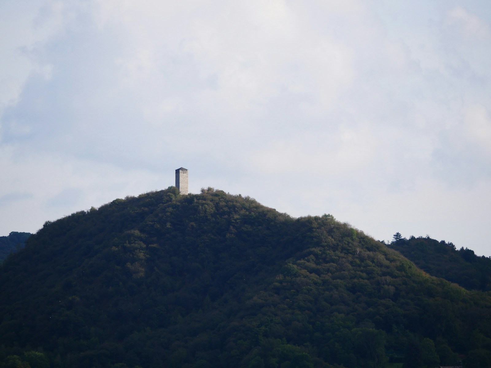 A hill with a tower on top of it