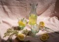 clear glass pitcher with lemon juice