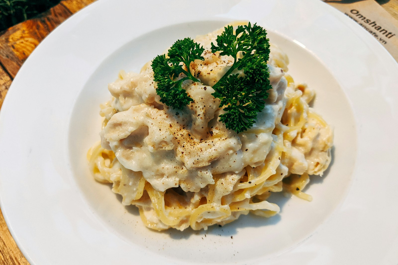 pasta with broccoli on white ceramic plate