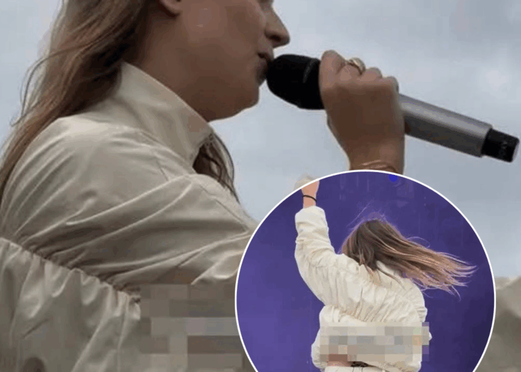 Zangeres Roxy Dekker in kort rokje laat net iets veel zien tijdens optreden